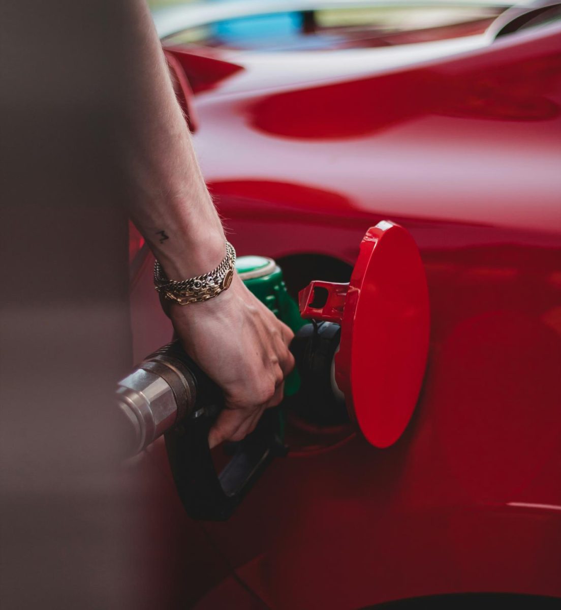 Since February, gas prices have jumped from an average of $2.98 a gallon to over $4 dollars in some places. With a drop in prices looking uncertain in the near future, how are NHS drivers navigating the surge at the pump? (Photo courtesy of Wassim Chouak via Unsplash)