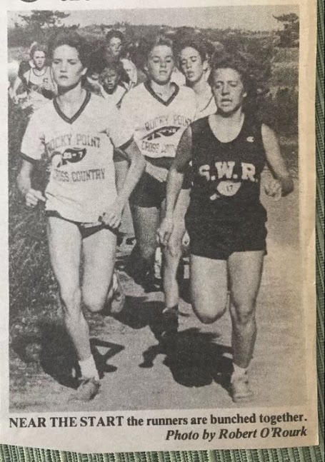 A young Deb Flaherty (left) starts her cross country race at Rock Point High School in Long Island, New York. Flaherty has had a competitive nature and deep love for running since a young age, something she now carries with her as a coach at NHS. (Courtesy of Deb Flaherty)