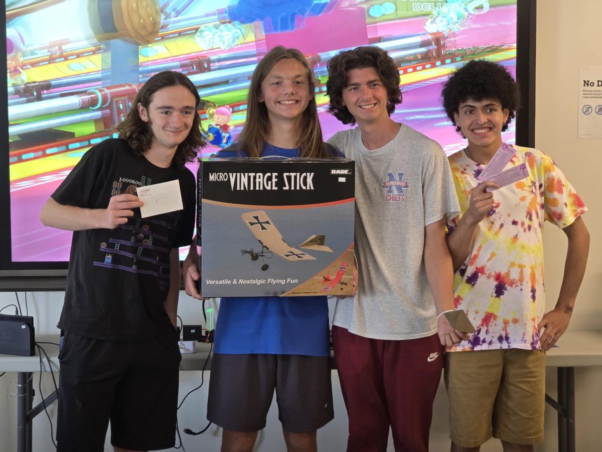 At the end of the intense tournaments, the four winners (from left: Brody Butterly, Flynn Amodio, Mark Street, Christain Julian) selected their trophies, picking out the prizes that they would enjoy the most. After a tough fight, they all celebrated in triumph.