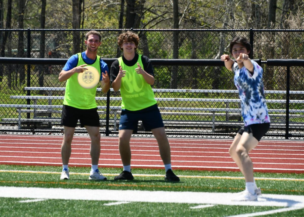 NHS seniors Brayden Whipple, Billy Herr, and Matt Clifford celebrate a score during ultimate frisbee. This year's seniors will graduate in less than two weeks and seniors, as well as faculty, see a bittersweet ending to this school year. 