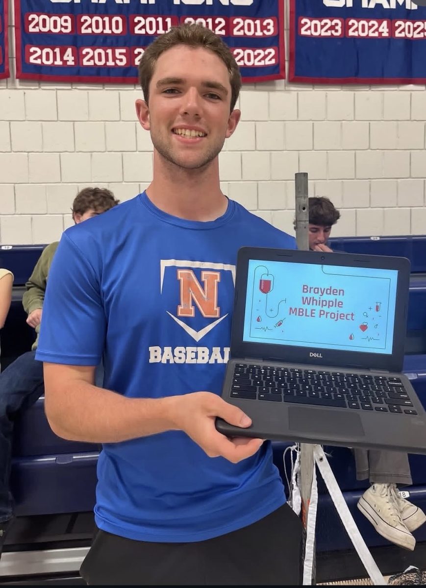 NHS senior Brayden Whipple is one of many seniors showing off their project they have been working on all year. MBLE’s is a great way for students to showcase their time and energy they put into their projects. (Courtesy of NHS Instagram) 