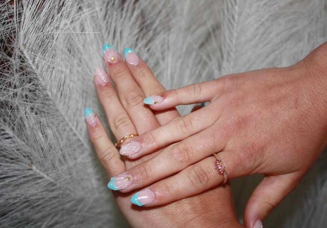 Maeve Sommers shows off her nails done by Gemma Hedrei, a sophomore at NHS. Sommers came to Hedrei to do her birthday nails. (Courtesy of Gemma Hedrei's Instagram)
